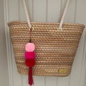 Josephine Alexander straw tote is in excellent condition.